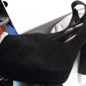 Velvet high heel shoes.